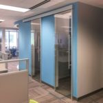 Colorful panels and modular glass walls for San Diego offices