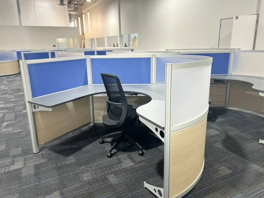 The completed open floor: 500 contemporary curvilinear modern office cubicles installed across Upper Deck's new Carlsbad headquarters.