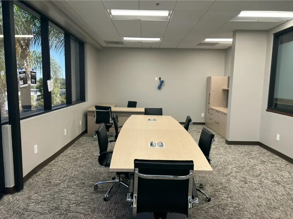Meeting table matched to height adjustable executive desk, we used existing chairs to save client money.