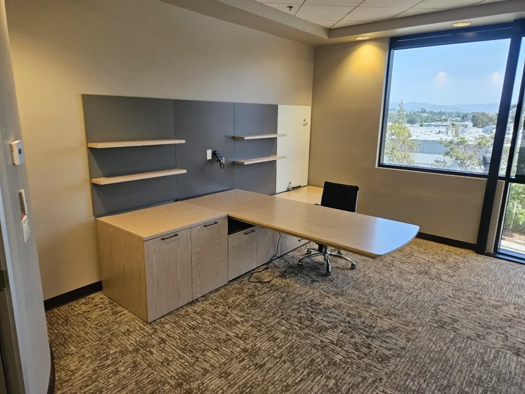 Getting ready to add the monitor that doubled as a TV for presentations. The unilever desk is height adjustable. Instally add chairs and have a huddle or work independently.